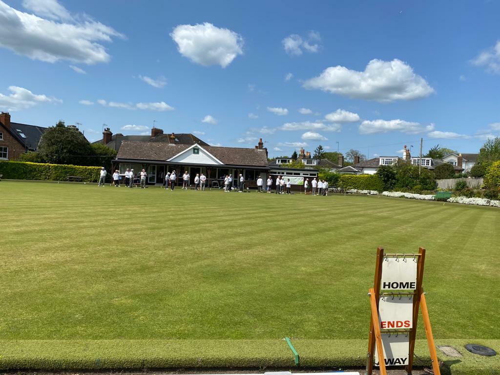 A view of the green and clubhouse